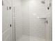 Modern bathroom shower featuring white subway tiles at 761 Stone Trace Ct, Avon, IN 46123