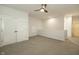 Bonus room with carpeted floor, ceiling fan, closet with double doors, and stairway access at 761 Stone Trace Ct, Avon, IN 46123