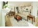 Spacious open-concept living room with a fireplace and a view into dining and kitchen area, perfect for gatherings at 761 Stone Trace Ct, Avon, IN 46123