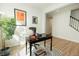 Inviting home office featuring a sleek black desk, stylish decor, and ample natural light for productive work at 761 Stone Trace Ct, Avon, IN 46123