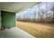 Green home with a covered patio space and a large backyard, offering a serene outdoor retreat at 761 Stone Trace Ct, Avon, IN 46123