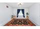 Cozy bedroom with a decorative rug, natural light, and neutral walls, creating a tranquil space at 7658 Hillway Dr, Indianapolis, IN 46113