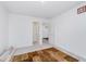 Bedroom with grey carpet, neutral walls, and an open doorway to the hallway at 7658 Hillway Dr, Indianapolis, IN 46113