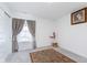 Bedroom with grey carpet, neutral walls, and modern window coverings at 7658 Hillway Dr, Indianapolis, IN 46113