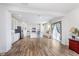 Open kitchen with stainless steel appliances, white cabinets, and a breakfast bar for casual dining at 7658 Hillway Dr, Indianapolis, IN 46113