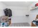 Walk-in closet features built-in shelving at 7658 Hillway Dr, Indianapolis, IN 46113