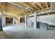 Spacious unfinished basement with exposed ceiling and potential for customization at 7859 Moore Rd, Gosport, IN 47433