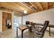Unfinished basement featuring exposed ceiling, workspace, and ample potential at 7859 Moore Rd, Gosport, IN 47433