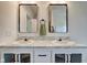 Bathroom featuring double sinks, modern fixtures, and a clean, neutral design at 7859 Moore Rd, Gosport, IN 47433