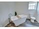 Bright bathroom with a freestanding tub, modern fixtures, and natural light at 7859 Moore Rd, Gosport, IN 47433
