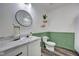 Well-lit bathroom featuring modern finishes, updated vanity, and stylish decor at 7859 Moore Rd, Gosport, IN 47433