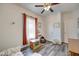 Bright bedroom with a ceiling fan, lots of natural light and laminate flooring at 7859 Moore Rd, Gosport, IN 47433