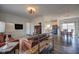 Open-concept living room flows into the kitchen and dining area, great for entertaining at 7859 Moore Rd, Gosport, IN 47433