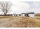 A large property with a house and separate garage or outbuilding at 7859 Moore Rd, Gosport, IN 47433
