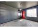 A bright room with natural light coming from large windows at 7859 Moore Rd, Gosport, IN 47433