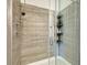Modern shower with tiled walls and a glass door at 7859 Moore Rd, Gosport, IN 47433