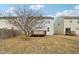 Backyard features a wood deck, healthy trees, and a wood fence at 8074 Carina Dr, Indianapolis, IN 46268