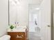 Well-lit bathroom with a single sink and view to an upper-level hallway at 8074 Carina Dr, Indianapolis, IN 46268