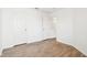 This bedroom has neutral walls, vinyl wood flooring, and two closets at 8074 Carina Dr, Indianapolis, IN 46268