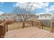 Deck overlooks the spacious backyard with lush green grass at 8074 Carina Dr, Indianapolis, IN 46268