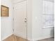 Bright entryway with a white door, modern fixtures, and clean lines at 8074 Carina Dr, Indianapolis, IN 46268