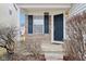 Inviting front porch with charming details, complemented by a cozy and welcoming entrance at 8074 Carina Dr, Indianapolis, IN 46268