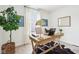 Bright home office with hardwood floors, a desk, chair, and accent decorations at 8074 Carina Dr, Indianapolis, IN 46268