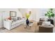 Comfortable living room with a stylish glass coffee table, neutral sofa, and modern accents at 8074 Carina Dr, Indianapolis, IN 46268