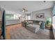Cozy living room features a large sectional sofa and an open layout at 8727 Faulkner Dr, Indianapolis, IN 46239
