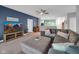Comfortable living room featuring a sectional sofa and an open layout, perfect for relaxing at 8727 Faulkner Dr, Indianapolis, IN 46239