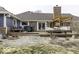 Expansive backyard with a spacious deck, perfect for outdoor gatherings and enjoying the green surroundings at 8901 Rocky Ridge Rd, Indianapolis, IN 46217