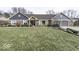 Charming brick home with a well-maintained front yard and attached two-car garage at 8901 Rocky Ridge Rd, Indianapolis, IN 46217