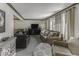 Spacious living room with large windows, comfortable seating, and contemporary decor at 8901 Rocky Ridge Rd, Indianapolis, IN 46217