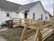 This cozy one-story home features a wheelchair ramp that leads directly to the front door entrance at 1023 Union St, Columbus, IN 47201