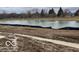 Image of a pond on a property featuring potential waterfront living in a community with scenic views and natural beauty at 10959 Morab Dr, Zionsville, IN 46077