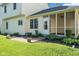 Exterior view of the screened porch and garden area at 11866 Weathered Edge Dr, Fishers, IN 46037