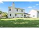 Expansive backyard features a well-manicured lawn and mature trees, offering ample space at 11866 Weathered Edge Dr, Fishers, IN 46037