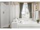 Relax in this bathroom with a soaking tub, separate shower, and bright natural light at 11866 Weathered Edge Dr, Fishers, IN 46037