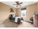This bedroom features carpeted floors and a fan at 11866 Weathered Edge Dr, Fishers, IN 46037