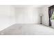 Bright, spacious bedroom with neutral carpet, a large window, and a minimalist aesthetic at 11866 Weathered Edge Dr, Fishers, IN 46037