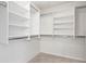 Spacious walk-in closet with multiple shelves and ample hanging space at 11866 Weathered Edge Dr, Fishers, IN 46037