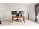 Home office with modern desk setup and comfortable seating provides an ideal workspace at 11866 Weathered Edge Dr, Fishers, IN 46037