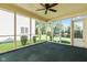 Inviting screened porch overlooks the manicured backyard at 11866 Weathered Edge Dr, Fishers, IN 46037