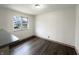 Eat-in kitchen area featuring bright natural light and complementary wood flooring at 1221 Kessler Blvd E Dr, Indianapolis, IN 46220