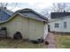 Small shed with double doors, a side door, and a pathway to the house at 1228 E Perry St, Indianapolis, IN 46227
