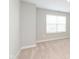 Bright bedroom features neutral walls, plush carpeting, and a window for natural light at 1231 Langham St, Avon, IN 46123