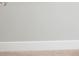 Close-up of baseboard and carpet, shows beige carpet against a white wall at 1231 Langham St, Avon, IN 46123