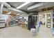 Unfinished basement with concrete floors, exposed ductwork, and plenty of storage space at 14 Kessler Blvd W Dr, Indianapolis, IN 46208