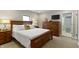 Comfortable bedroom with wooden furniture and a serene atmosphere at 14 Kessler Blvd W Dr, Indianapolis, IN 46208