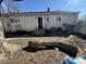 Backyard featuring patio, access to the house, and an outdoor space at 1428 S Euclid Ave, Indianapolis, IN 46203